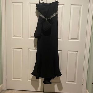 Jovani strapless, form fitting, floor length dress with rhinestone belt.